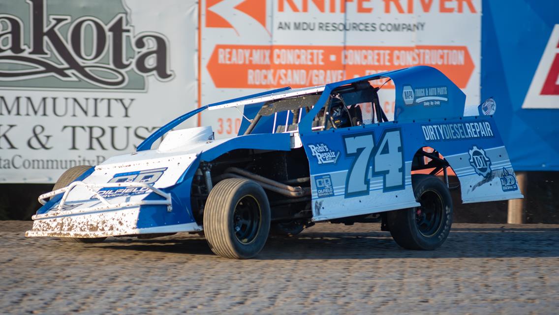 MEDLER HANGS ON FOR SPORT MOD WIN