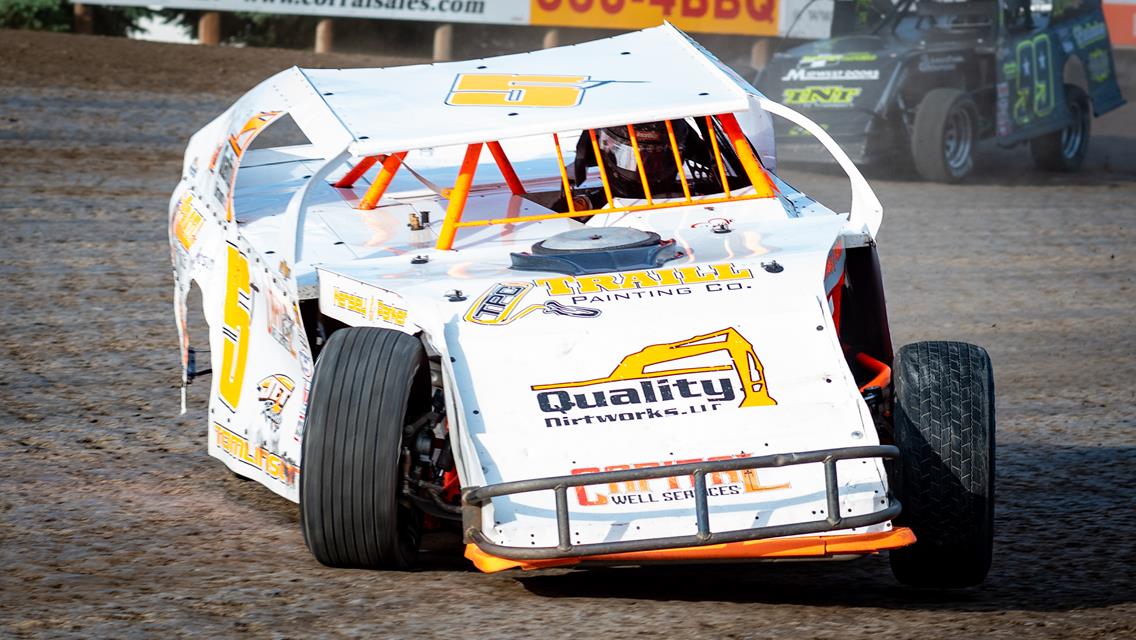 TOMLINSON WINS RAIN SHORTENED FEATURE VICTORY