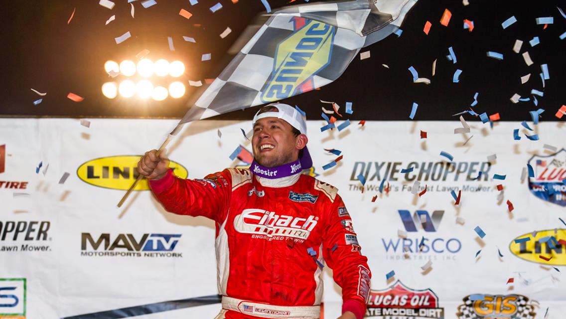 Devin Moran in Lucas Oil Victory Lane with the Sunoco Racing Flag