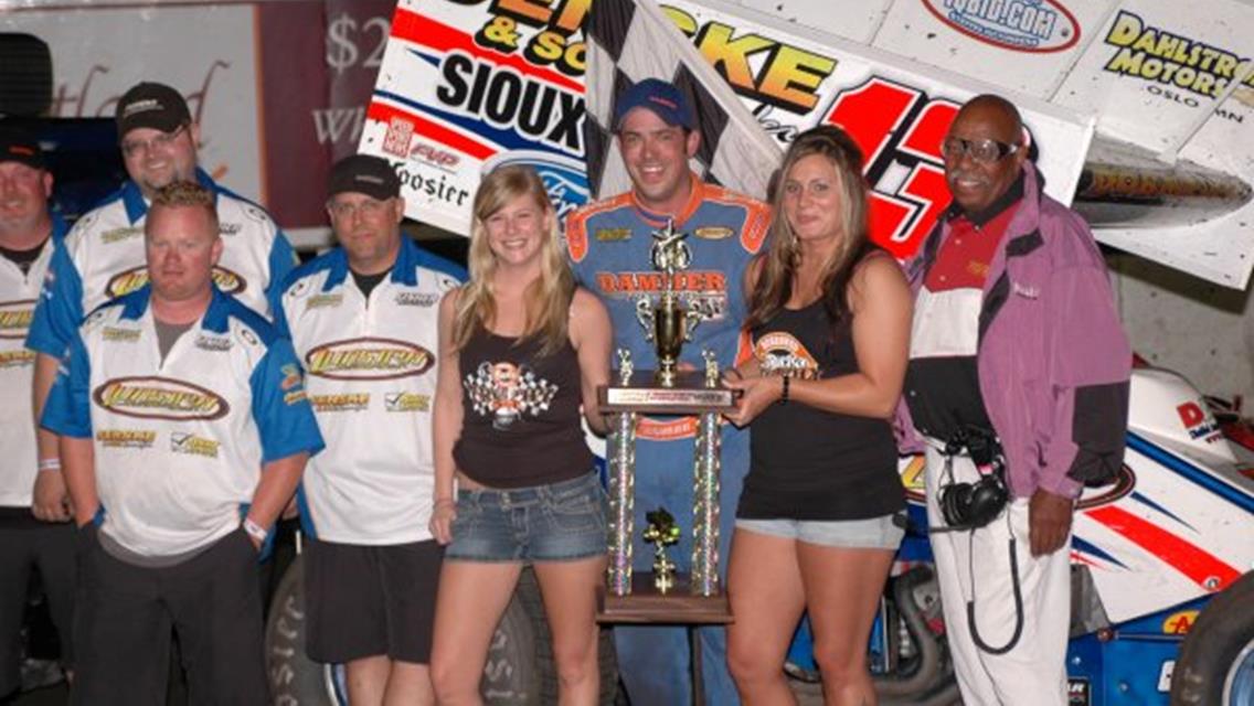Mark and crew in victory lane at Huset's